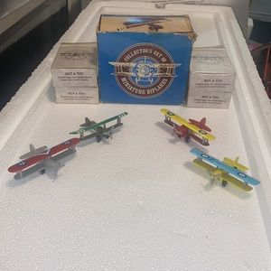 Vintage Collectors Set of 4 Miniature Biplanes Readers Digest Airplanes